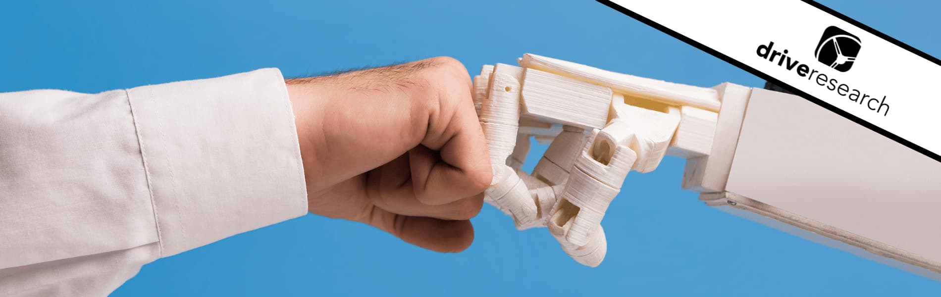 man and AI robot punching fists
