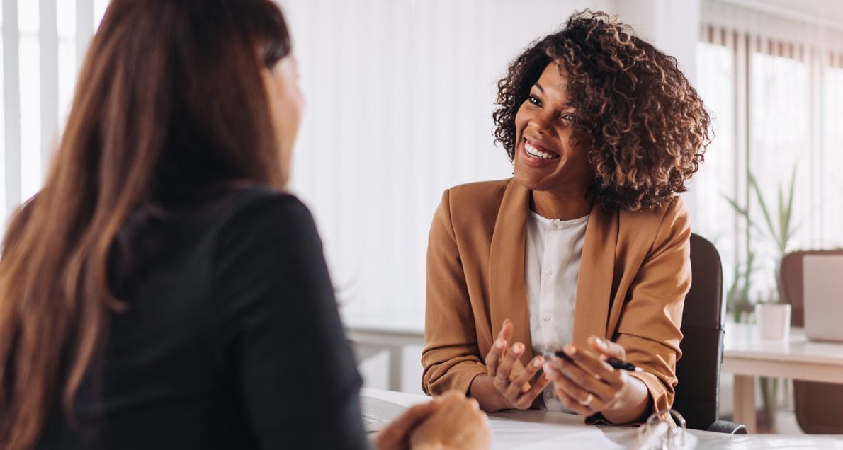 Woman consulting another woman