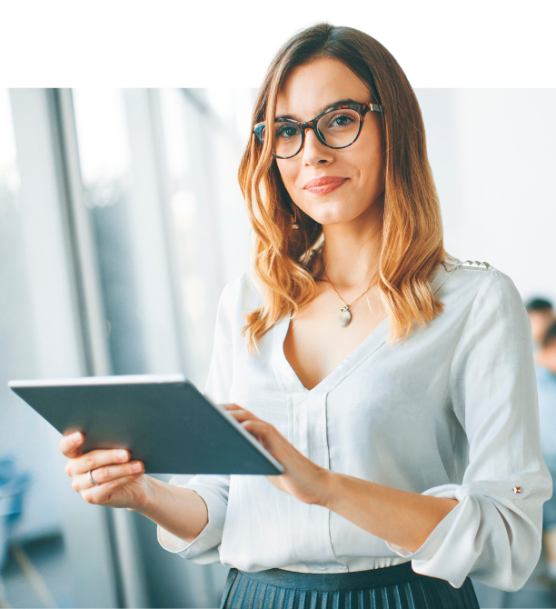 Blonde woman with glasses holding tablet