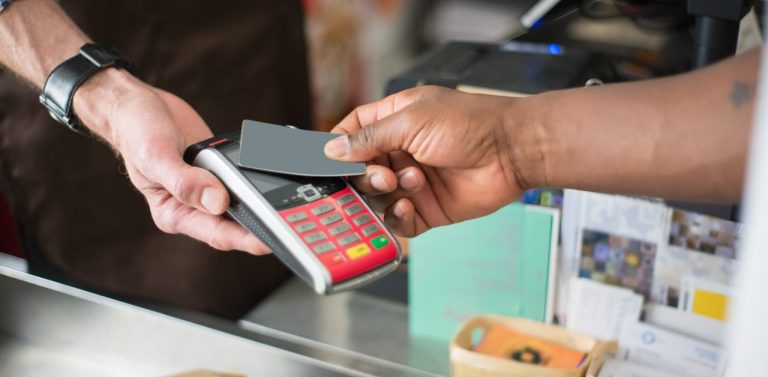 Person Paying Using a Bank Card