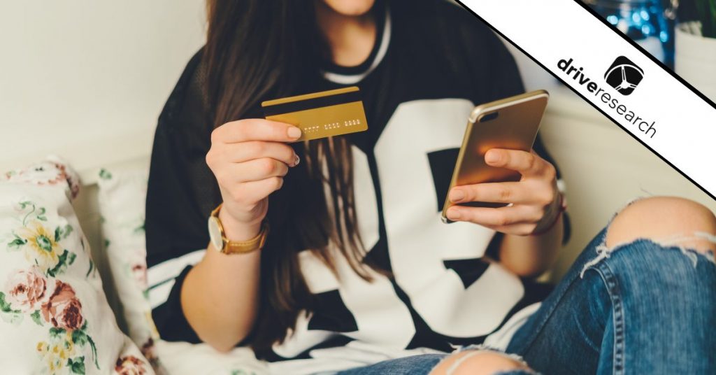 Gen Z girl shopping online with credit card
