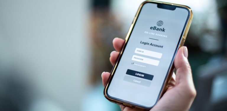 Mobile banking app on phone person is holding
