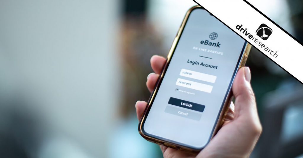 Mobile banking app on phone person is holding - drive research