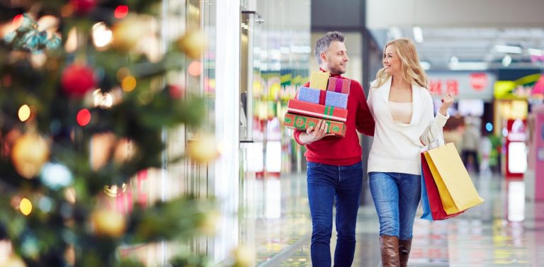 Man and woman holiday shopping