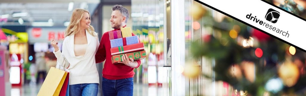 Man and woman holiday shopping - Drive Research