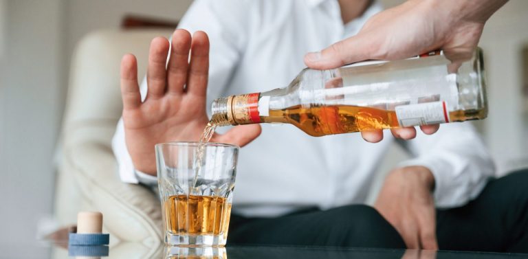 Someone saying no to alcohol