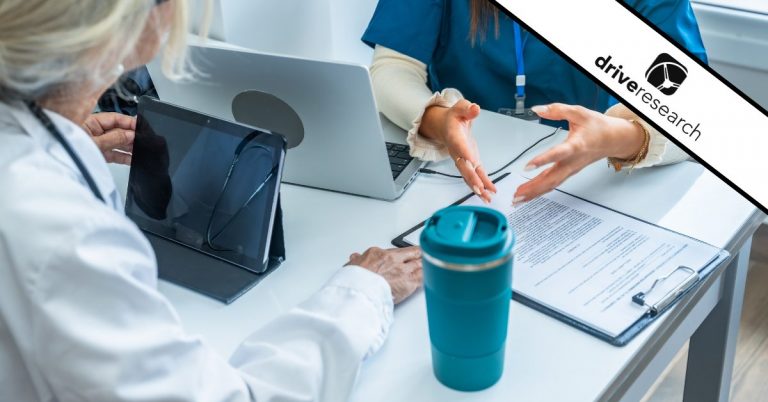 doctor and nurse discussing customer experience in a healthcare setting