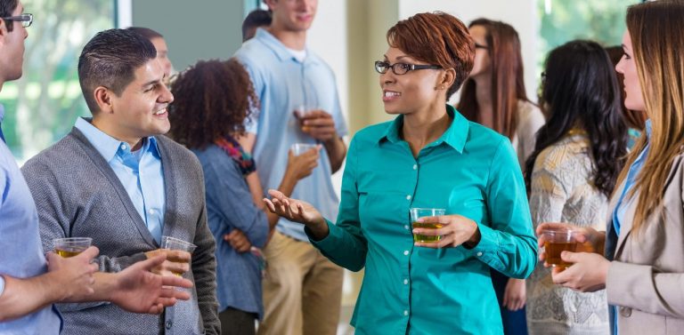 Professionals and alumni talking during mixer or party
