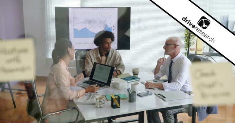 team works on a product development research in a jobs to be done format in an office