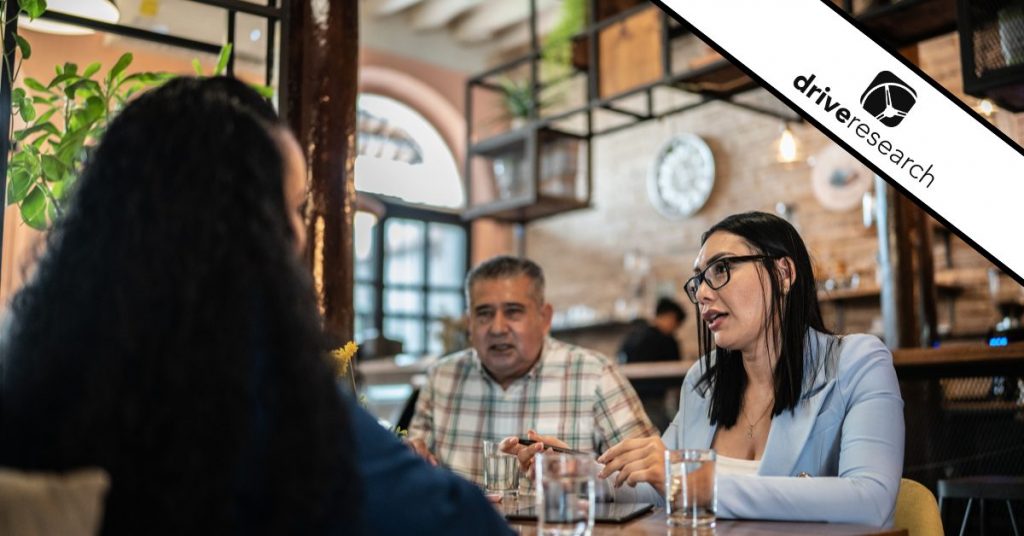 a team carrying out a restaurant customer survey