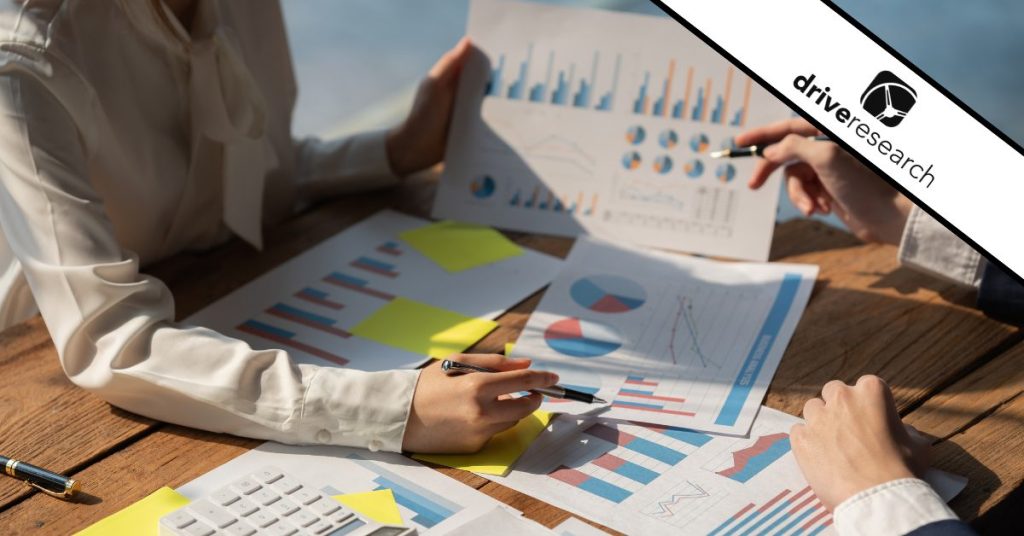 Business people share conjoint analysis charts - drive research