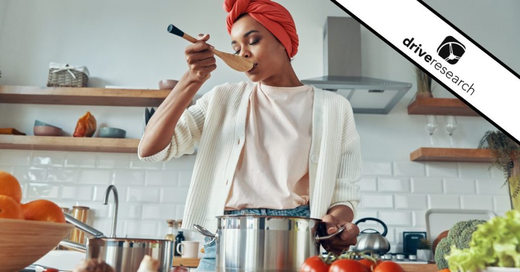 Woman doing a product taste test in her kitchen - drive research