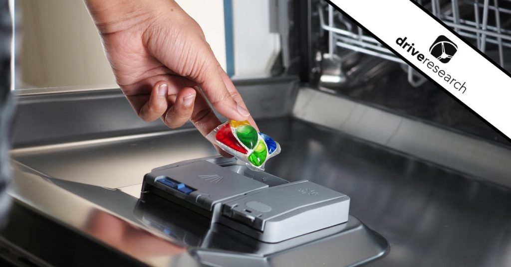 product test participant filling dishwasher with detergent pod - drive research