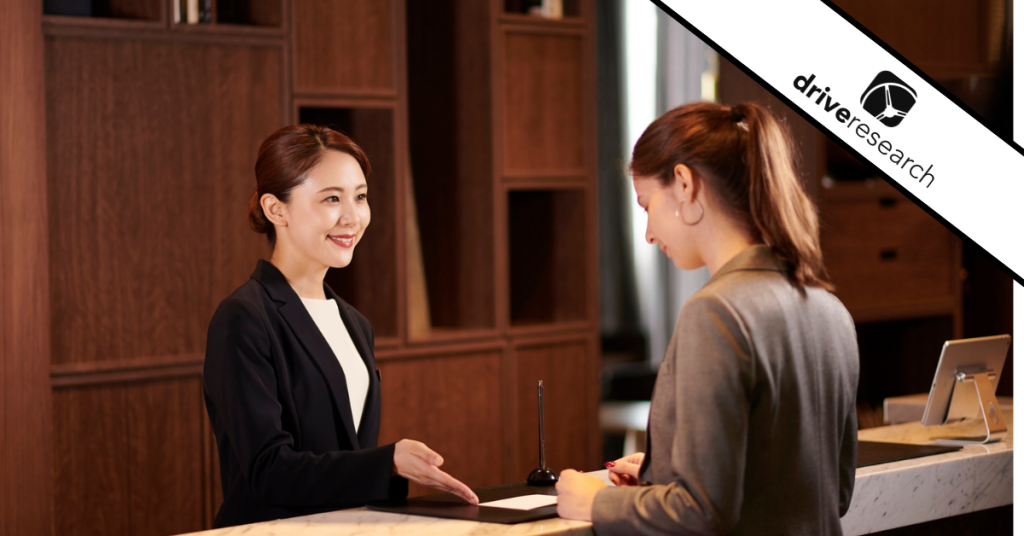 Hotel employee providing satisfactory service to a guest.