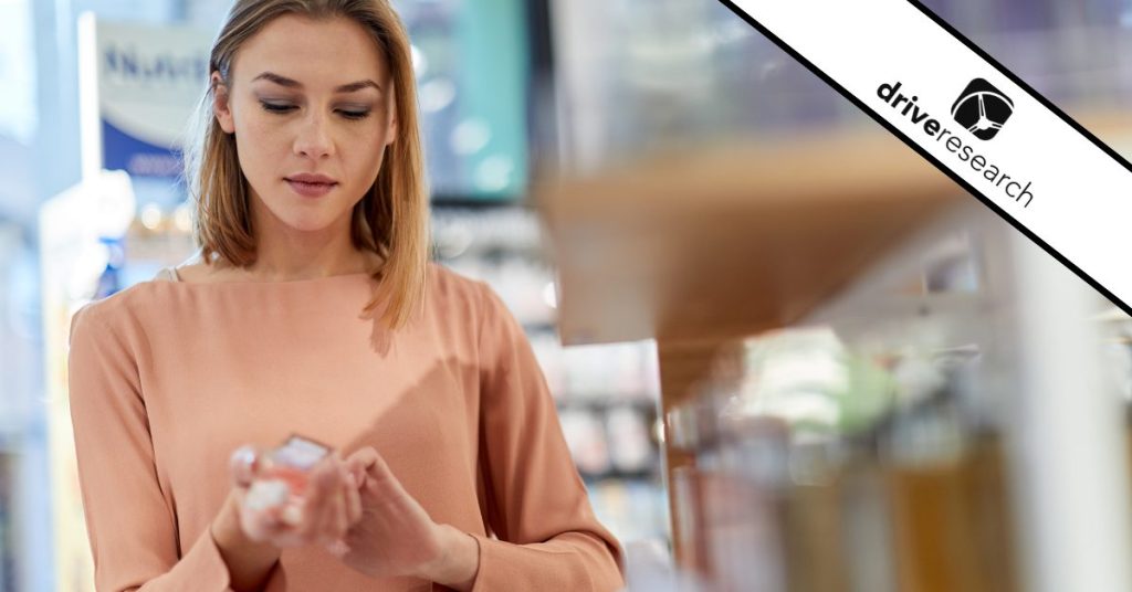 Woman conducting scent testing on her wrist